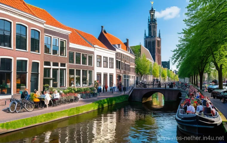 유럽 여행 중 네덜란드에서 꼭 가야 할 곳 - **Utrecht: Canal-side Life with Dom Tower Backdrop**
An inviting wide shot of Utrecht's unique t...